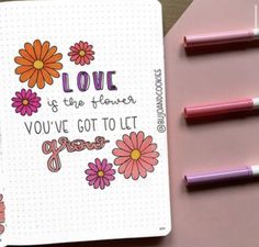 a notepad with flowers and the words love is the flower you've got to let grow