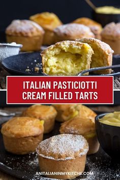 italian pastries and cream filled tarts on a black plate with powdered sugar