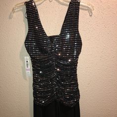 New Evening/Cocktail Dress! Excellent Condition, Never Worn. Silver Fitted Evening Dress For Dinner, Fitted Metallic Dinner Dresses, Fitted Metallic Holiday Evening Dress, Metallic Fitted Dinner Dress, Silver Holiday Evening Dress For Night Out, Silver Evening Dress For Holiday Night Out, Silver Evening Dress For Night Out And Holiday, Fitted Sequin Dress For Holiday Dinner, Fitted Sequin Dress For Dinner And Holiday