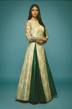 Mehendi Outfit - Cream and Emerald Green Lehenga | WedMeGood Cream and Green Brocade Silk Floor Length Tunic with Gold Zari Work on the Arms, Emerald Green Silk Skirt. Find more Lehenga designs on wedmegood.com #wedmegood #lehenga #mehendi Indian Wedding Dress Modern, Modern Indian Wedding, Sangeet Outfit, Rock Outfit, Desi Clothes, Indian Gowns, Indian Couture, Lehenga Saree, Indian Attire