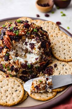 a plate with crackers and cheese on it