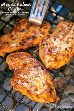 grilled chicken is being cooked on the grill