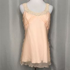 * 100% Silk Peach Top * Crochet Lace Scoop Neck W/ Sequin Shimmer. * Scalloped Edging * Completely Lined * P2p Laid Flat: 18” * Overall Length: 27” * Smoke Free Home. Peach Fitted Sleeveless Tank Top, Fitted Sleeveless Peach Tank Top, Fitted Peach Sleeveless Tank Top, Fitted Orange Camisole Tank Top, Peach Top, Orange Cream, Crochet Lace, Camisole Top, Scoop Neck