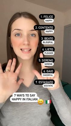 a woman is holding her hands up with five different languages in front of her face