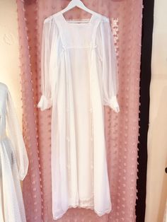 Stunning soft and floaty chiffon white vintage wedding dress Original 1970s Perfect for a boho bride just team it with a flower crown and you are ready to go Very Full Balloon Sleeves with deep cuffs with press stud fastening and trimmed with lace Empre waist trimmed little bows and lace and has long ribbons hanging at the back and front (could very easily be taken off if preferred) Back zip Beautiful ethereal vintage original 1970s wedding dress! Bust 34/35 Hips free Length shoulder to front he Floaty Wedding Dress, 1970s Wedding Dress, 1970s Wedding, Cool Bride, Vintage Gowns, Long Balloons, Boho Bride, Boho Wedding Dress, Wedding Dresses Vintage