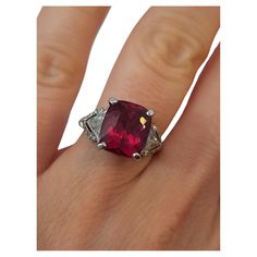 STONE: Natural Diamonds: Approx 1.00Ctw STONE: Natura Pink Tourmaline: 5.00Ctw MATERIAL: Platinum DIMENSIONS: Size 5 FREE RESIZING WEIGHT: 5.9 grams Comes with Appraisal Gia Certified Cushion Cut Ruby Ring For Formal Occasions, Formal Gia Certified Cushion Cut Ruby Ring, Formal Ruby Gemstones With Vvs Clarity, Formal Ruby Gemstones With Accent Stones, Classic Radiant Cut Ruby Ring For Formal Occasions, Formal White Gold Ruby Ring With Radiant Cut, Formal Radiant Cut Ruby Ring With Center Stone, Dazzling Ruby Ring With Accent Stones For Formal Events, Formal Cushion Cut Gemstones With Accent Stones