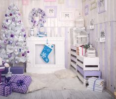 a decorated christmas tree sitting next to a white fireplace in a room with purple and silver decorations