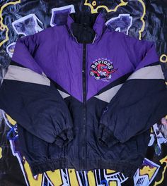 Vintage 1990s Toronto Raptors Pro Player Puffer Jacket In great condition Light fade Normal wear XL 27.5 x 28 Pit to Pit Any questions feel free to reach out! 90s Style Windbreaker For Winter Streetwear, 90s Style Winter Windbreaker For Streetwear, Vintage Purple Windbreaker For Streetwear, Throwback Hooded Outerwear For Streetwear, 90s Style Purple Sports Outerwear, Cute Lazy Day Outfits, Lazy Day Outfits, Sun Valley, Toronto Raptors