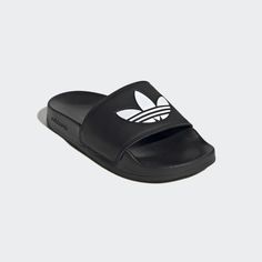 Sporty Adidas Slides For Swimming, Sporty Adidas Slides Suitable For Water, Adidas Logo Synthetic Slides For Swimming, Adidas Slides For Swimming With Synthetic Material, Adidas Slides With Logo For Swimming, Adidas Slides For Swimming With Logo, Casual Adidas Slides For Swimming, Adidas Logo Slides For Swimming, Adidas Logo Synthetic Slides For Streetwear