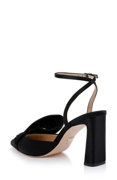 An asymmetric vamp bow adds contemporary dimension to an elegant satin pump framed by a pointy toe and demi block heel. 3 1/2" heel Adjustable ankle strap with buckle closure Memory foam cushioning Textile upper/leather lining and sole Imported Satin Closed Toe Evening Heels, Evening Satin Closed-toe Heels, Evening Heels With Satin Bow And Ankle Strap, Evening Block Heel Heels With Satin Bow, Elegant Block Heel Heels With Satin Bow, Elegant Block Heels With Satin Bow, Formal Block Heels With Satin Bow, Block Heel Bow Heels For Evening, Evening Heels With Bow And Block Heel