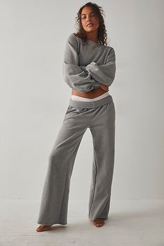 So cozy and essential, these wide-leg sweatpants feature a mid-rise fit and ribbed waistband with raw-edge hemlines. **Fit:** Mid-rise, relaxed fit with wide-legs, full-length **Features:** Soft cotton-blend, recycled fabrication, ribbed elastic waistband, raw-edge hemlines, side-pockets lined in soft jersey **Why We | Recycled Fleece Wide-Leg Pants by Richer Poorer at Free People in Grey, Size: M Wide Leg Sweatpants, Lounge Set, Black Fits, Boho Clothing, Wide Leg Trousers, Boho Outfits, Pullover Styling, Fashion Collection, Outfit Sets