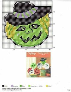 an image of a cross stitch pattern with the words happy halloween on it and a green pumpkin wearing a witch's hat