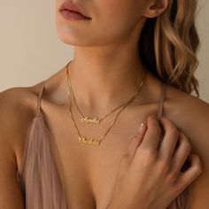 • Material: High-Quality Solid 925 Sterling Silver • Finish: Sterling Silver ∙ 18K Gold ∙ Rose Gold• Dimensions: Depending on your font choice, height sizes range from 3mm to 4mm lowercase SKU: MM-NM92F97 Double Name Necklace, Double Name, Popular Fonts, Gold Top, Custom Name Necklace, Double Chain, Perfect Gift For Mom, Multi Strand Necklace, Chain Choker