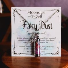 Our Fairy Dust Spell Jar Amulet Necklace contains a powerful blend of rose quartz, amethyst, rose petals, blue cornflowers, and fairy dust glitter, each chosen for their mystical properties. It is accompanied by a silver fairy charm. Handcrafted with care and intention, this unique piece serves as a beacon of connection to the fairy realm. Stainless Steel 20 inch chain. Vial is 1.5" in length.  If you would like the spell jar necklace without the charm, or would like a different charm, message u Spiritual Pink Charm Necklace As Gift, Pink Spiritual Charm Necklace For Gift, Spiritual Pink Charm Necklace For Gift, Purple Fairycore Jewelry For Gifts, Fairycore Purple Jewelry As A Gift, Mystical Nickel-free Crystal Necklaces For Gifts, Magical Silver Crystal Necklace For Gift, Silver Crystal Necklace For Gift With Magical Style, Fairycore Purple Necklace For Gift