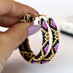 Wonderful purple hoop earrings  will be great birthday gift for women. This earrings is made of highest quality Japanese Toho beads. â¿ Diameter of hoops : 2.2 inch â¿ 100% handmade. â¿ Packed in gift bag. You will receive the same piece as pictured!!! Piece of my soul, which I left in this work, will warm you even in the most difficult and sad days. I am sure; this earrings will become your lucky charm that you would enjoy wearing day and night. Small Hoop Handmade Earrings As Gift, Gift Hoop Beaded Earrings, Handmade Pink Hoop Earrings, Handmade Beaded Hoop Earrings Gift, Handmade Beaded Hoop Earrings For Gifts, Black Hoop Earrings With Colorful Beads For Gift, Black Hoop Earrings With Colorful Beads As Gift, Gift Black Hoop Earrings With Colorful Beads, Handmade Round Hoop Earrings For Gifts