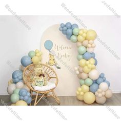 winnie the pooh balloon arch for a baby's first birthday