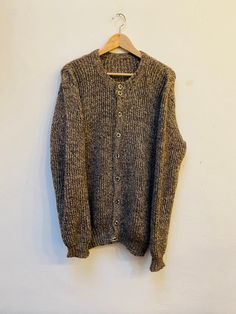 Please notice since we are a very small shop it's not possible for us to accept returns 🌼 Vintage Cardigan  Size M/L for Men Oversized for Women hole in the back (look at the pictures) Länge/ Length: 81cm Length from Armpit to Armpit: 62cm comfy and ready to wear ! Condition : good vintage condition * We check our clothes before we send them to you 🌼 * Feel free to write us if You have any questions 🌼 *Please always check measurements before buying * If something went wrong and you are not ha Casual Wool Sweater, One Size Casual Wool Sweater, Oversized Vintage Wool Sweater, One Size Vintage Winter Cardigan, Vintage Crew Neck Cotton Cardigan, Oversized Vintage Knit Cardigan, Vintage Brown Sweater With Button Closure, Vintage Relaxed Fit Cardigan For Fall, Brown Oversized Vintage Sweater