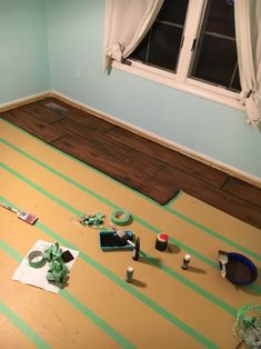 the room is being painted and ready to be used as a playroom for children