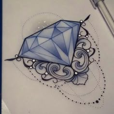 a drawing of a blue diamond on paper