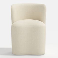 an upholstered chair is shown in white linen with a rounded back and foot rest