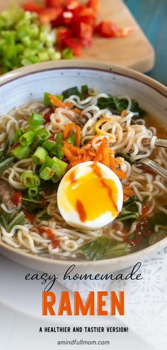 a bowl of ramen with an egg on top