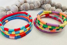 These summer color bracelets are perfect to add on to any bracelet set that you might have or even to wear by themselves. They are made from 4mm heishi beads and ready to give your wrist some pop of color! PRODUCT DETAILS  Bracelets are strung on high quality stretchy cord.Easy to roll on your hand and take off.  -Closure:tie LENGTH:  You can reference the bracelet sizing chart in photos.  BRACELET CARE: -treat gently  -avoid water and moisture PACKAGING:  Placed in a dainty mesh drawstring jewelry bag with a ribbon and note attached.  Please do not hesitate to ask any questions!  This shop assumes no responsibility for bracelets that are sold Multicolor Stacked Heishi Beads Stretch Bracelet, Multicolor Stacked Heishi Beads Bracelets, Multicolor Stacked Bracelets For Beach, Color Bracelets, Multicolor Bracelet, Bracelet Rainbow, Stack Bracelet, Chapel Hill Nc, Tie Length