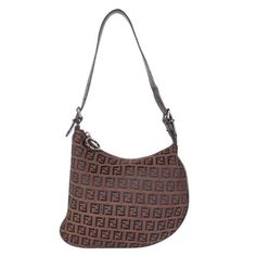 Authentic, brown Fendi Zucca shoulder bag. Features Zucca canvas with leather trim, flat leather strap that is adjustable, silvertone hardware, zipper top closure, large interior with interior slip pocket. Perfect bag for day to evening wear. Add your cosmetics, wallet, keys, phone, and more. This is a gorgeous bag by Fendi! Country of Origin: Italy Strap drop: 9.5" Brown Monogram Canvas Bag With Silver-tone Hardware, Modern Monogram Canvas Evening Shoulder Bag, Modern Monogram Canvas Shoulder Bag With Zipper Closure, Designer Brown Hobo Bag For Evening, Leather Formal Shoes, Bag Packaging, Brown Canvas, Gorgeous Bags, Zipper Top