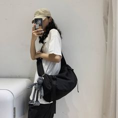 Machine wash and hang dry for optimal quality. Bags For Tomboys, Korean Bags Aesthetic, Sling Bag Outfit Korean, Tomboy Bag, Outfit With Sling Bag, Slingbag Wanita, Sling Bag Outfit, Black Monkey, Desain Tote Bag