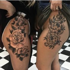 two women's thigh tattoos with roses on them