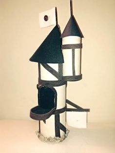 a white and black castle made out of cardboard