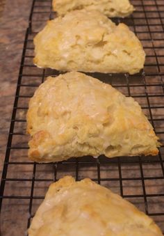 three scones cooling on a wire rack