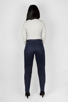 * FINAL SALE * This sleek work trouser comes with a secret weapon: a hidden expandable waistband for a comfy fit, even on your off days. Complete with thoughtful details like a 4” hem that is perfect for cuffing (or lengthening), and sensible, deep pockets. - Model is 5'5" and measures 40.5" at the hip. She is wearing a size S- Hidden, expandable waistband for comfort fit- 4" hem for easy cuffing and lengthening- Waist-to-hip ratio designed for hourglass body shapes- Deep, functional pockets tha Fitted Straight Pants With Pull-on Style, Stretch Bottoms With Tapered Leg For Business Casual, Stretch Tapered Leg Bottoms For Business Casual, Elegant Navy Bottoms For Fall, Fitted Pants With Elastic Waistband For Business Casual, Navy Fitted Elastane Pants, Fitted Dress Pants With Elastic Waistband For Business Casual, Elegant Stretch Navy Pants, Navy Stretch Pants For Business Casual