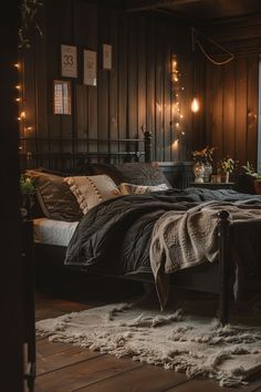 a bed sitting in a bedroom next to a window with string lights on the wall