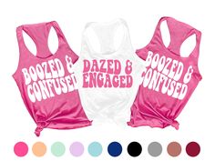 two women's pink and white tank tops with let's go girls written on them