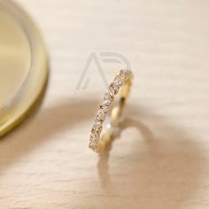 DESCRIPTION OF RING- Stone Detail :-• Center Stone : Moissanite Diamond• Stone Shape : Marquise / Round Cut• Stone Clarity : Excellent• Stone Color : White- Metal Detail :-• Metal Type : 925 Sterling Silver/10 Carat/14 Carat Gold/18 Carat Gold• Metal Tone: Yellow Gold/Rose Gold/White Gold• Metal Stamp : YesMoissanite Wedding Ring, 18K Solid Gold Wedding Band, Moissanite Wedding Band, Promise Band, Rose Gold Band✥ PRODUCTION ✥We are jewelry artisans and manufacturers.Every Jewelry is made from the very scratch, and made by hand and carefully polished especially for you.✥ Free Engraving ✥✦ It’s a complimentary service, which could be done after customer requests.✦ Any special character or long message will be chargeable.✦ If your ordered jewelry has not enough space for your engraved word wi Moissanite Wedding Band, Metal Detail, Rose Gold White, Wedding Band, Solid Gold, Yellow Gold, Band, Yellow, Gold