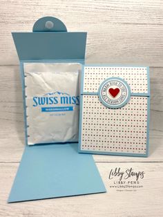 a card and envelope with a heart on it