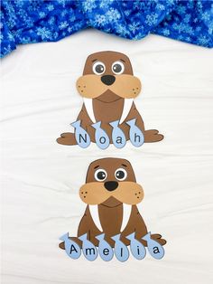 two sea otters with the word noah and an amelita on them