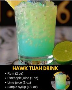 an advertisement for a drink with limes on the rim and blue liquid in it