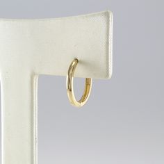 14K 12 mm Solid Gold Huggie Hinged Hoop Earring, Huggie Hoop, Gold Huggie, Small Gold Hoop, Cartilage, Conch, Helix, Tragus, EZ81L EZ81L Please note that this earring is made to order. S P E C S ♦ All of our jewelry is handmade in our studio in Seoul, Korea. ♦ 14K Yellow Gold / 14K Rose Gold ♦ Listing is for 1 Earring ♦ Huggie Dimensions: - outer diameter approximately 12 mm - inner diameter approximately 10 mm - hoop thickness 1.6 mm - post thickness 0.7mm - post length 5.5mm ♦ Metal Finish: Hi Yellow Gold Hoop Cartilage Earrings, Adjustable Small Hoop Classic Cartilage Earrings, Hoop Cartilage Earrings With Ear Wire, Classic Adjustable Hoop Cartilage Earrings, Huggie Hoop Earrings As Gift, Huggie Earrings Gift, Small Gold Hoops, Seoul Korea, Gold Hoops