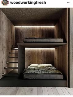 two bunk beds in a wooden room with stairs leading up to the top bed and bottom bed