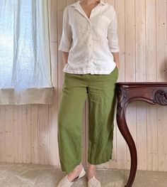 The pants are made of 100% linen. Two pockets, high waist. Elastic waistband. Green Wide Leg Pants With Pockets, Green Straight Pants With Welt Pockets, Green Summer Pants With Welt Pockets, Green Linen Wide Leg Pants For Spring, Spring Green Linen Wide Leg Pants, Green Ankle-length Pants With Welt Pockets, Green Linen Wide Leg Bottoms, Green Linen Wide Leg Pants For Work, Green Linen Straight Pants