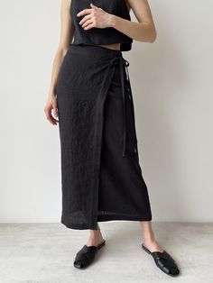 Linen Wrap Skirt with Slit, Black Linen Skirt, Maxi Wrap Skirt for Women, Maxi Wrap Skirt, Boho Skirt, High Waist Adjustable Tie Linen wrap skirt with slit.  Maxi wrap skirts with, perfect for warmer seasons day and night. Wear our wrap skirts with a cami top, trainers, flats or heels. Perfect for a dinner date, party, wedding and as an evening wear. Maxi wrap skirts can comfortably be adjusted at the waist to define and flatter. ■ color: black ■ material: 100% linen ■ style: - wrap skirt - relaxed fit - mid-calf length - high waist - textile belt -raw edge ■ to get the full look, check our crop top here: https://www.etsy.com/listing/1212085788/ ■ how to care: - Hand wash or gentle machine wash cycle 40oC / cold water - Hang to dry for best results. Avoid tumble drying to prevent color fad Black Linen Wrap Skirt, Black Linen Skirt Outfit, Wrap Skirt Outfit, Black Linen Skirt, Black Wrap Skirt, Wrap Skirt Pattern, Linen Wrap Skirt, Maxi Wrap Skirt, Long Wrap Skirt