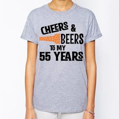 a woman wearing a t - shirt that says cheers and beers to my 37 years