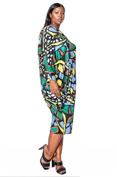 Transform your wardrobe with the captivating charm of our asymmetrical midi dress in a vibrant and colorful butterfly print. Designed to make you feel effortlessly elegant and confident, this dress is a dazzling blend of whimsical design and modern sophistication. Stand out with the dynamic and stylish asymmetrical neckline, adding a unique and contemporary twist to the classic midi length. Embrace the spirit of transformation and beauty with our bright butterfly print, designed to catch the eye Blue Butterfly Print Casual Dress, Casual Multicolor Maxi Dress With Asymmetrical Hem, Spring Midi Dress With Bold Print, Multicolor Abstract Print Midi Dress, Asymmetrical Multicolor Maxi Dress For Spring, Black Butterfly Print Dresses For Spring, Black Butterfly Print Dress For Spring, Casual Party Midi Dress With Vibrant Print, Casual Midi Dress With Vibrant Print For Party