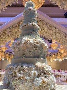 a large wedding cake sitting on top of a table