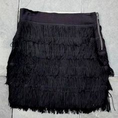 Bcbg Black Fringe Mini Skirt Sz Medium Nwt Side Zippers On Both Sides Stretchy Waist Band And Underskirt Waist 14.5 Inches Side To Side Length 177.5 Inches 50% Cotton/ 35% Modal/ 15% Spandex Smoke Free Home Fitted Black Mini Skirt With Fringe, Casual Fringe Mini Skirt For Party, Black Fringe Mini Skirt For Spring, Chic Black Fringe Mini Skirt, Black Fringe Mini Skirt, Fringe Mini Skirt, Black Fringe, Waist Band, Side Zipper