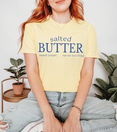 Salted Butter 🧈 Cute Comfort Colors Shirt Or Sweatshirt! SIZING & MATERIALS: Printed on Unisex Comfort Colors c1717 garment-dyed t-shirts or Comfort Colors 1566 Sweatshirts for a relaxed fit; the soft fabric brings extra coziness to your wardrobe while the relaxed fit makes it an excellent daily go-to. 💖   .: Tees are 100% ring-spun cotton, and sweatshirts are 80% Cotton/20% Polyester  .: Each sweatshirt comes with a relaxed fit, a rolled-forward shoulder, and a back neck patch. .: Medium T-sh Front Tuck, Sweat Shirts, Comfort Colors Shirt, Funny Christmas Shirts, Salted Butter, Stick Of Butter, Dye T Shirt, Star Fashion, Christmas Shirts