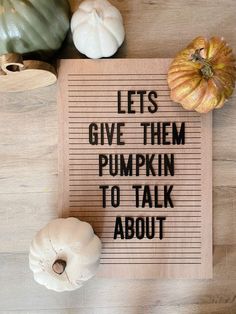 a wooden sign that says let's give them pumpkin to talk about