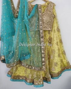 Yellow Net lehenga choli with turquoise dupatta for women. SIZE & STYLE: >You can either choose a standard sizing from size options on the listing. >All Standard sizes lehenga (Skirt) will be having fixed length 41 inches. Please contact if you want to change the lehenga length. >If you select custom size then we will send you measurements form after your order. And discuss all the customisation in detail before processing the order. >You can let us know for Blouse style changes e.g. change of neck designs etc. >Specific to sleeves on the blouse, please write in order notes if you want a sleeveless blouse to have sleeves or vice versa or just drop a message to us. >Tassels & Trims may or may not be exactly same always. >We ensure to show you final product and measurement images before disp Pista Green Fitted Bollywood Lehenga, Fitted Pista Green Bollywood Choli, Pista Green Lehenga With Unstitched Blouse And Traditional Drape, Fitted Pista Green Lehenga For Diwali, Pista Green Self Design Choli For Diwali, Pista Green Self-design Choli For Diwali, Semi-stitched Pista Green Lehenga With Unstitched Blouse, Pista Green Fitted Lehenga For Navratri, Semi-stitched Pista Green Choli With Self Design