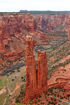 an aerial view of canyons and cliffs in the desert